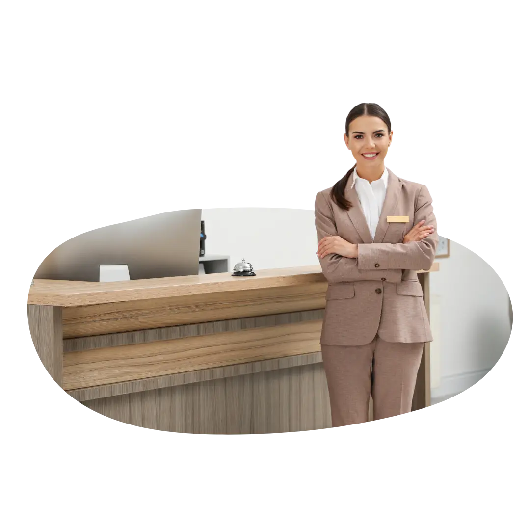 Hotel receptionist at front desk representing segmentation challenges